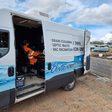 The staff is operating Elite Liquid Waste's CCTV van equipped with the most advanced CCTV camera and technology to identify the drain issues for the client.